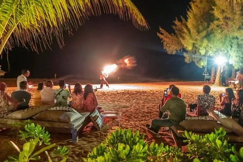 Fire eater show on the beach