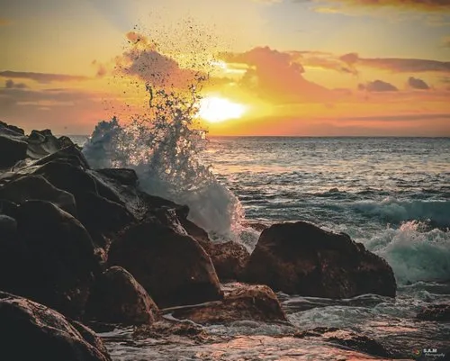Waves crashing during sunset at Albion
