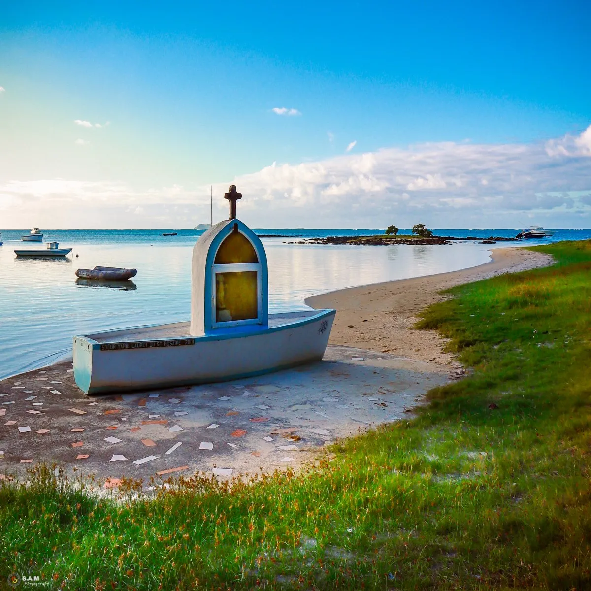 Praying boat shaped religious structure on the beach in Grand Gaube, Mauritius