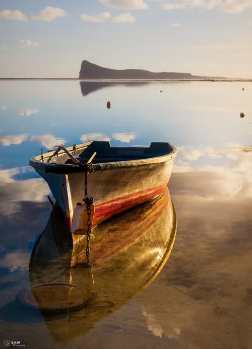 Moored boat near Coin de Mire island