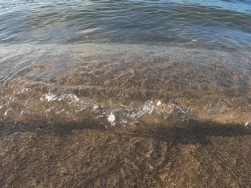 Small waves reaching the shore