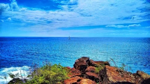 Blue sky with far away boat
