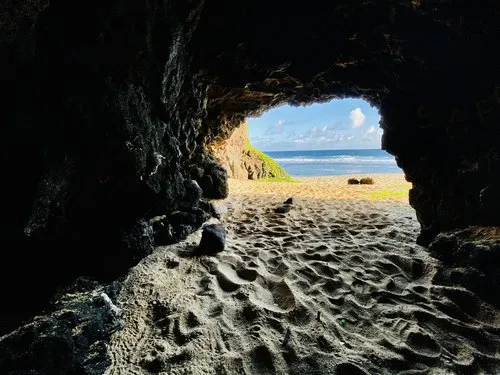 View of Gris Gris beach from inside a cave