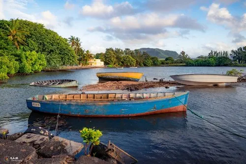 Old fishermen boats in Mahebourg bay