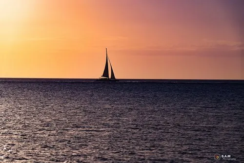 Sail boat silhouette at Sunset