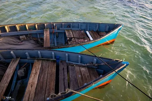 Blue pirogues side by side