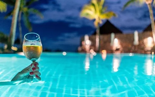 Wine Glass in 5-star hotel illuminated pool