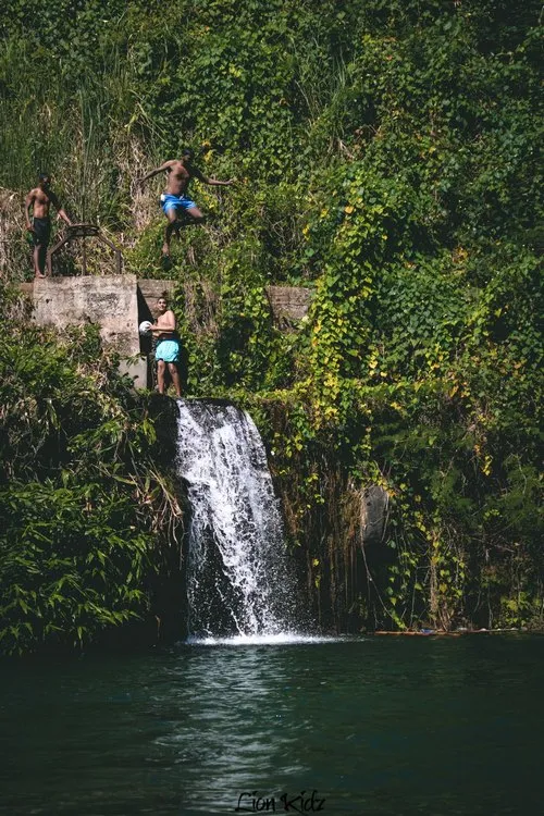 Children jump in Marmite river