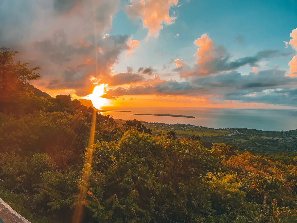 Sunset over Chamarel viewpoint with forest and Le Morne mountain in Mauritius