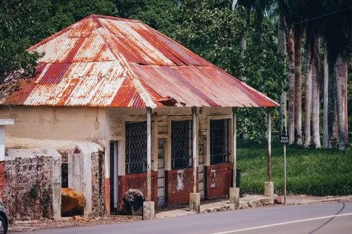 Old abandoned tailor store at riche en eau