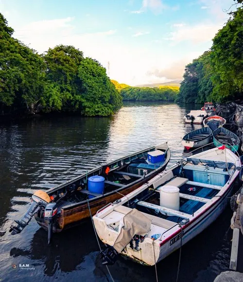Fishing boats side by side at Le Batelage in Souillac