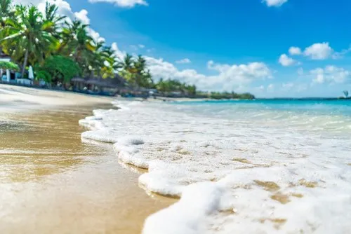 Amazing sea foam reaching Belle Mare beach