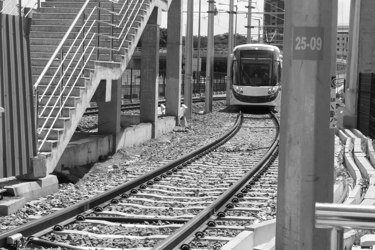 Tram train running along tramway in Port Louis, Mauritius during the day
