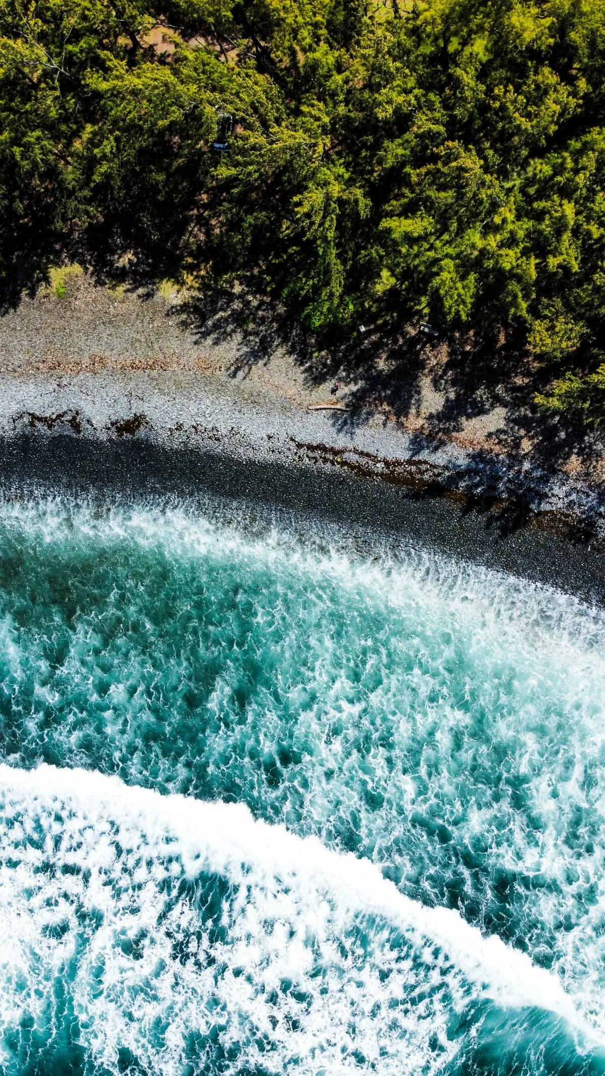 Aerial drone photo of Rivière des Galets beach with turquoise waters and rocky coastline in Mauritius