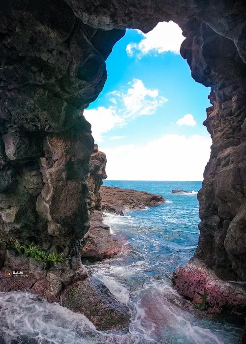 Natural window over ocean