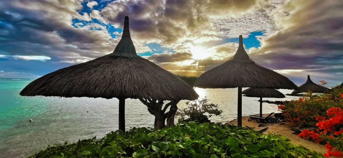 Sunset view over the lagoon at Canonnier Beachcomber Hotel in Mauritius with colorful skies