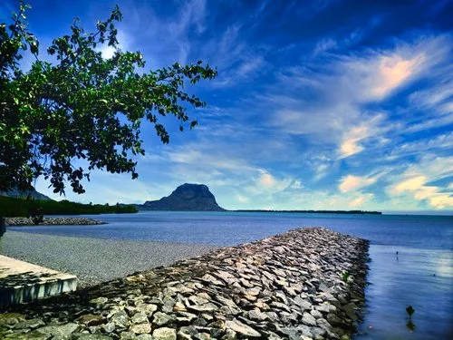 Man made rocky jetty near Le Morne