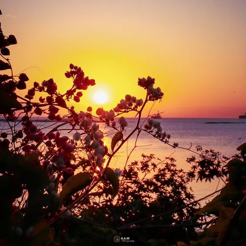 Sunset at Baie du Tombeau beach