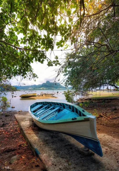 Pirogue at Mahebourg with Lion Mountain