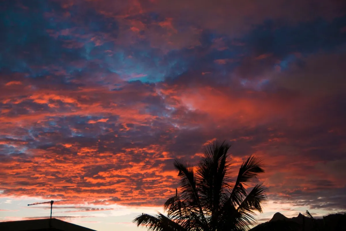 Reddish clouds glowing after sunset over the Mauritius sky