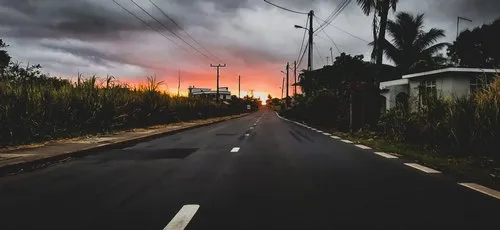 Sunset at the end of the road