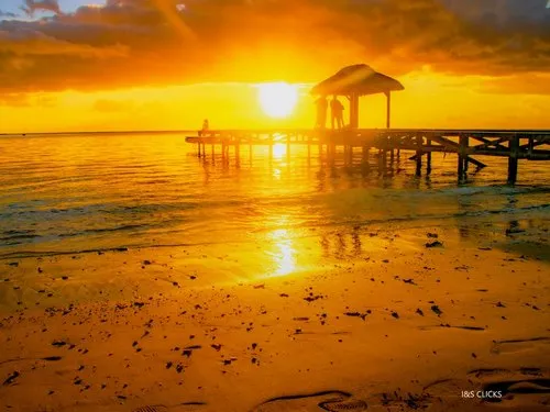 Sunset and light beam at Wolmar Jetty
