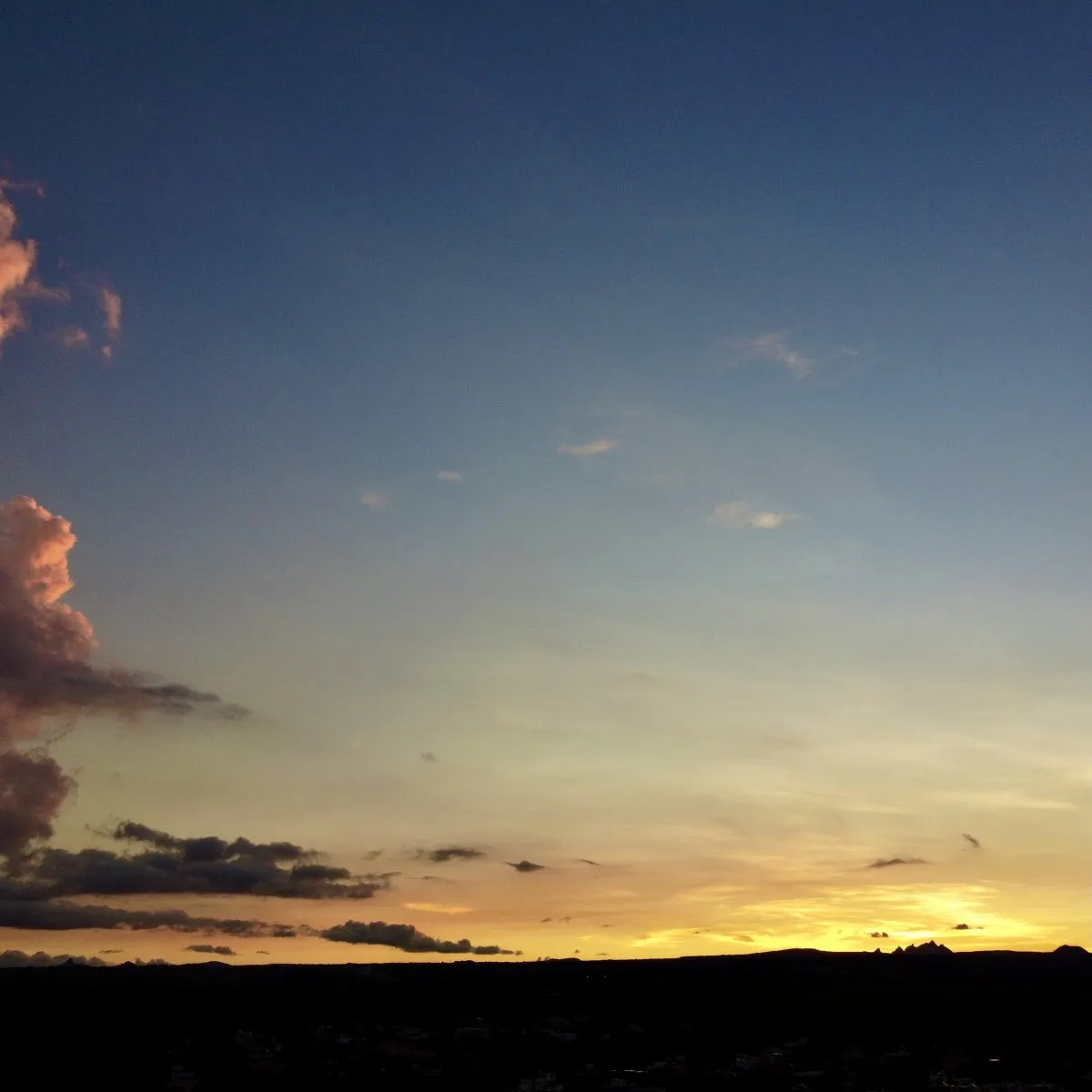Silhouette scene at dusk after sunset over Mauritius captured by drone