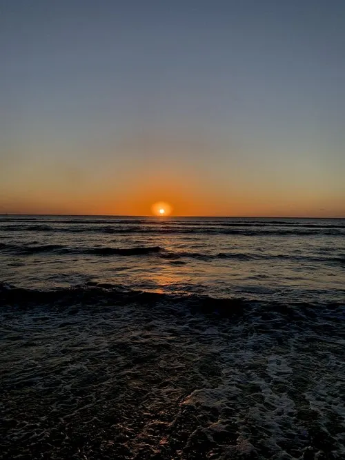 Sunset over the dark sea of Mont Choisy